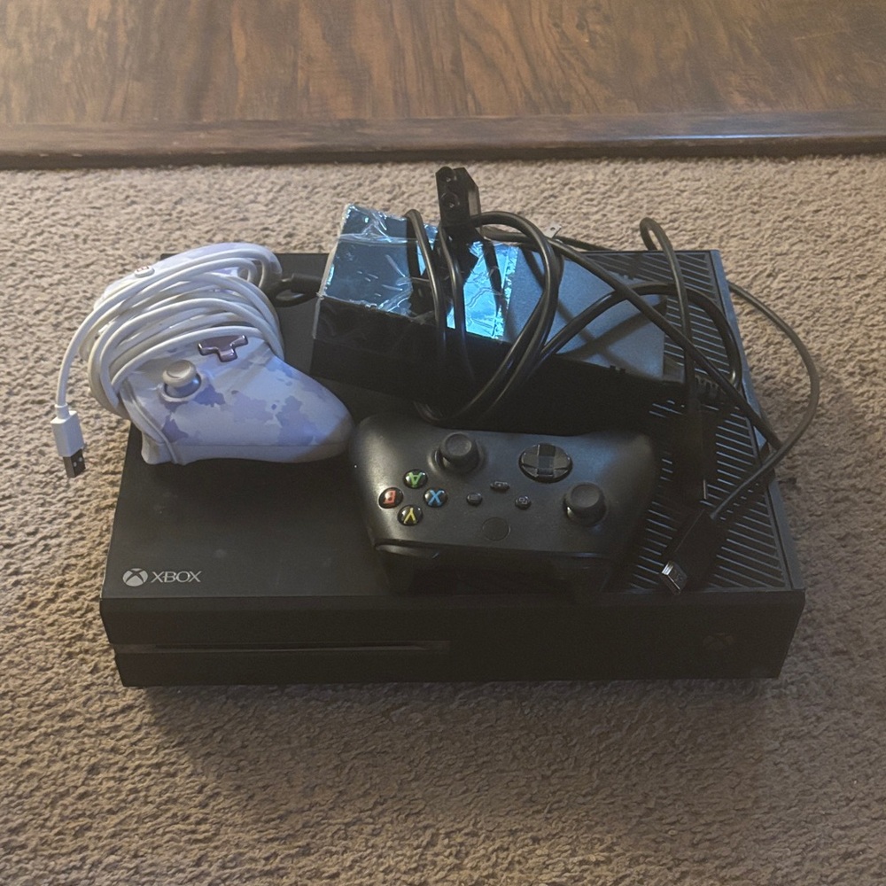 One Black Console Bundle with Black and White Controllers